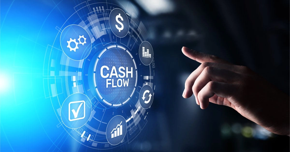Hand pointing to a digital interface showing cash flow management icons and the text 'CASH FLOW.'